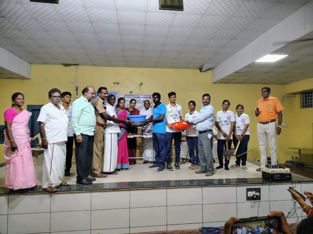 Volunteers preparing food for community distribution program