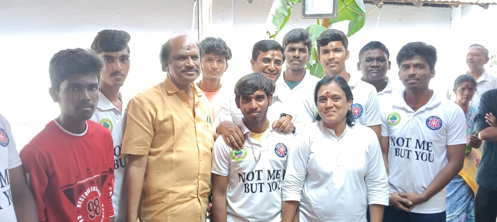 Community leaders discussing social welfare initiatives